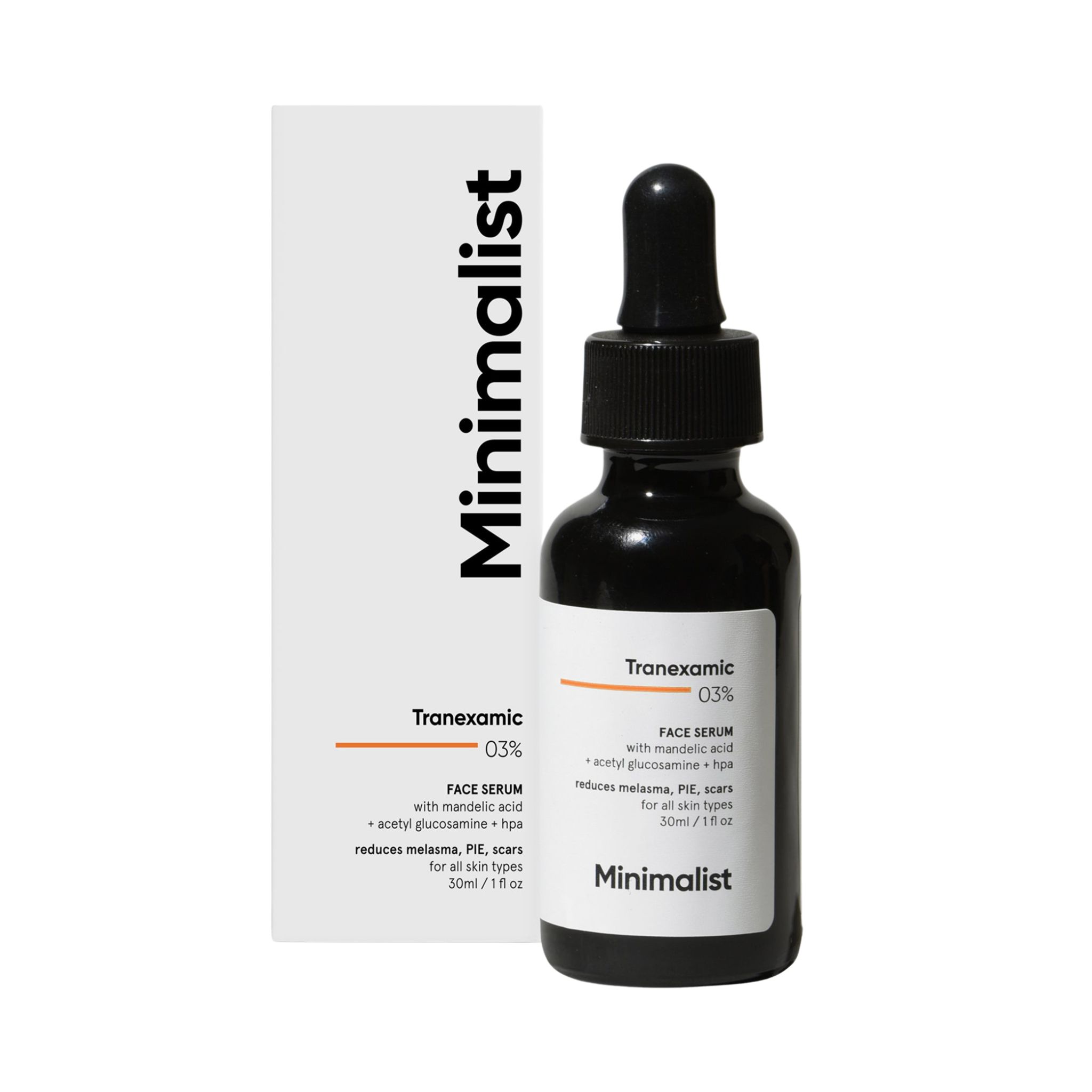 Schwarze Serumflasche mit Pipette und Verpackung. Aufschrift: Tranexamsäure 03%, Face Serum, Minimalist.