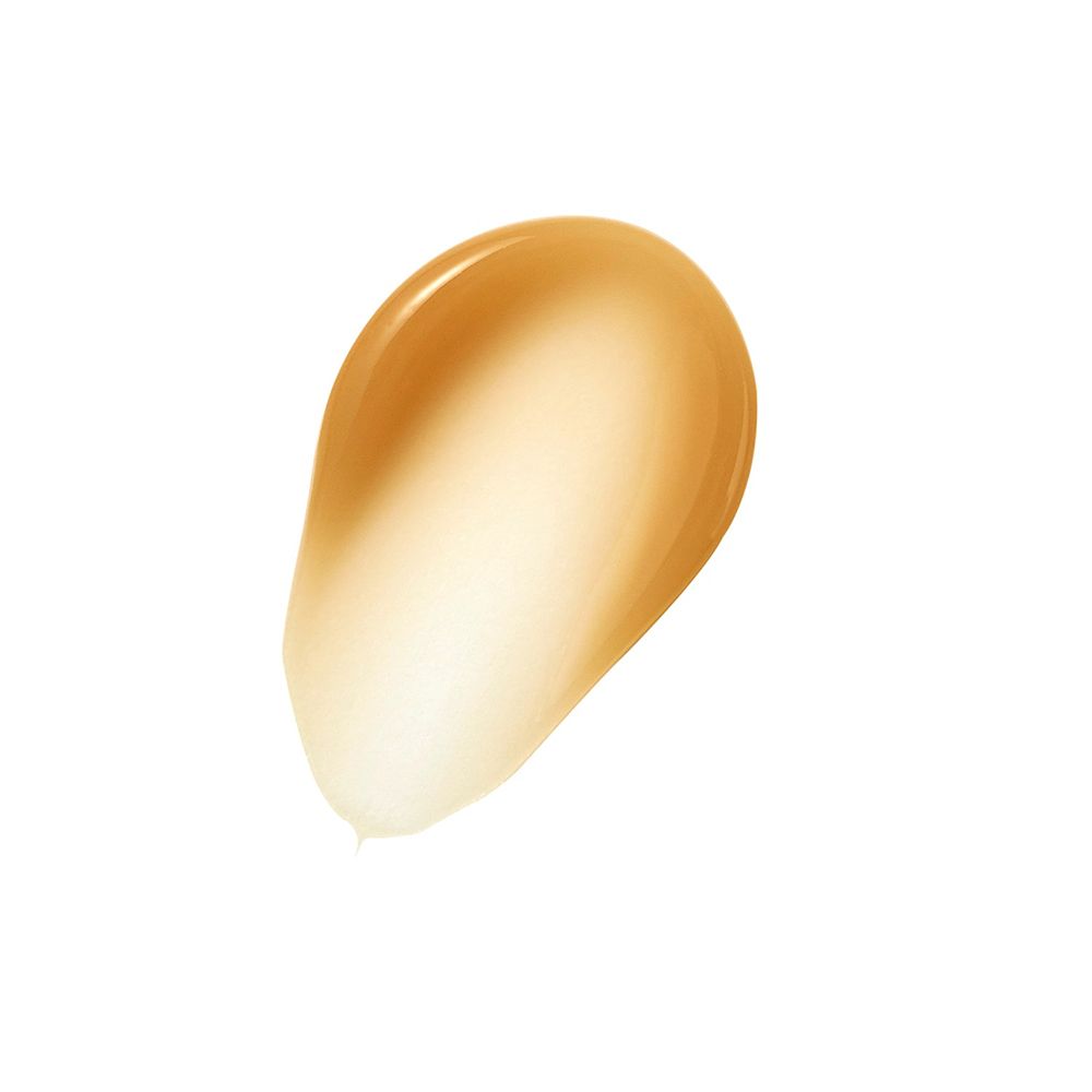 Klecks Creme, gelb-braun, auf weißem Hintergrund.