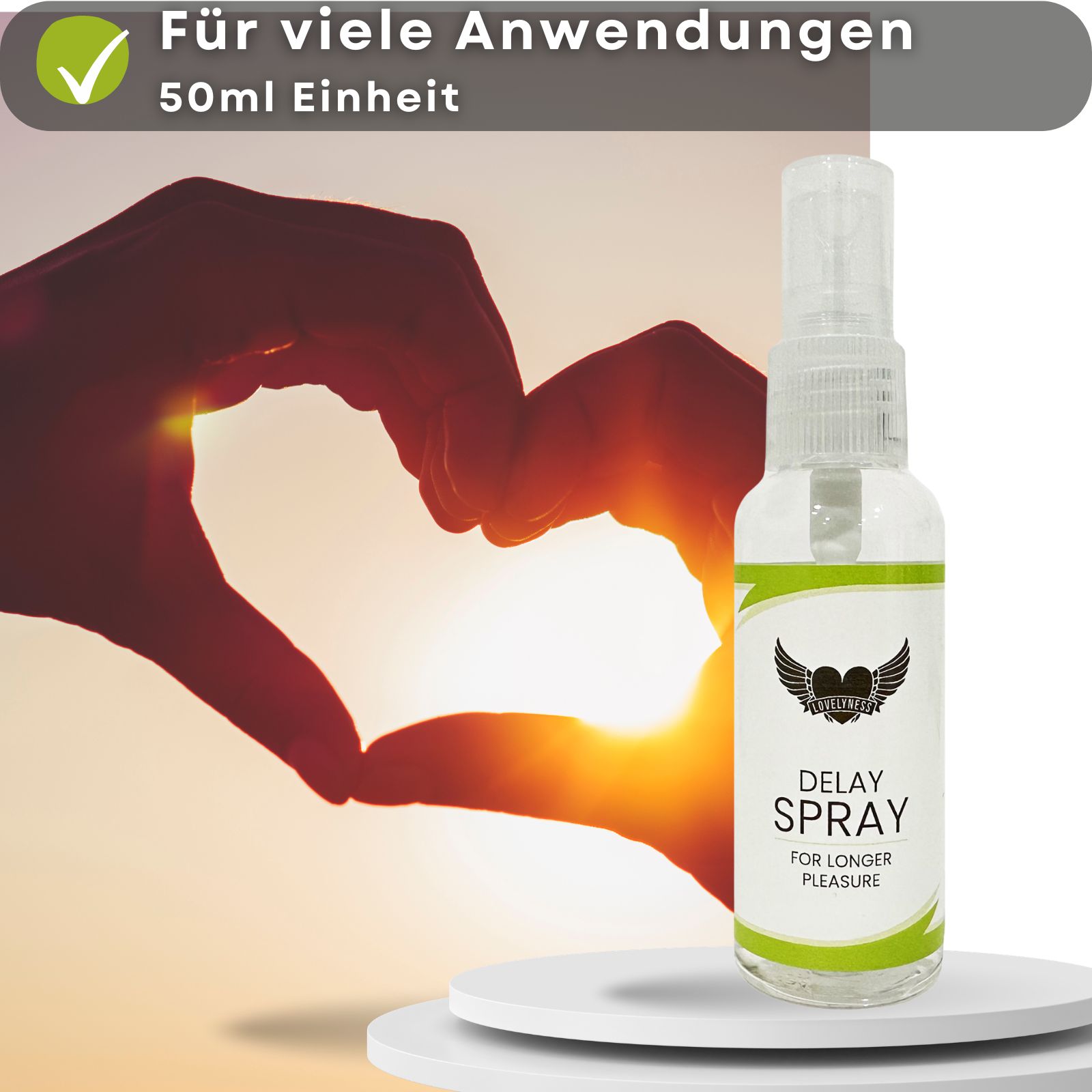 Sprayflasche mit Text: Delay Spray. Aufschrift: For longer pleasure. Banane mit Kondom.