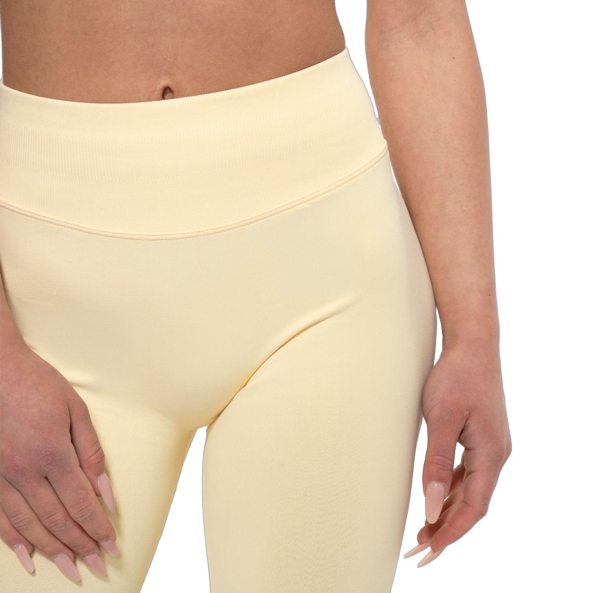 Detailansicht Damen Leggings in Buttergelb, hohe Taille.