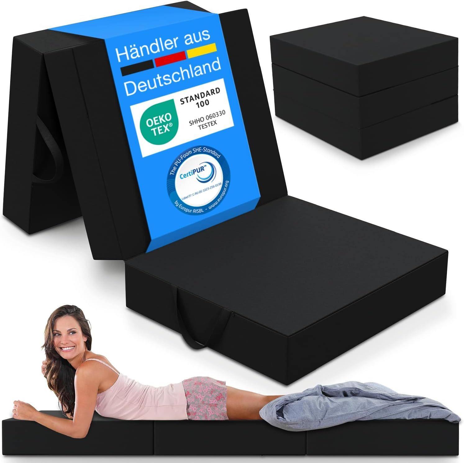 Schwarze Klappmatratze, gefaltet und ausgeklappt. Oeko-Tex-Zertifizierung. Frau liegt auf ausgeklappter Matratze.