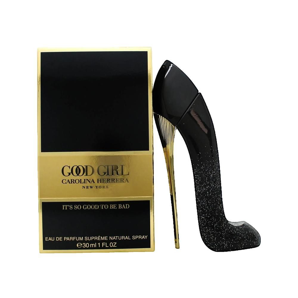 Schwarzer High Heel Flakon neben einer schwarzen Schachtel mit goldenen Akzenten. Aufschrift: GOOD GIRL CAROLINA HERRERA.