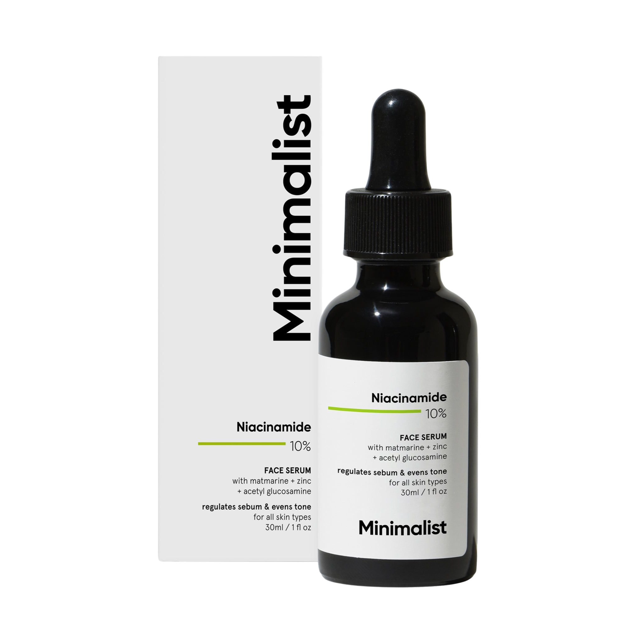 Serumflasche und Verpackung. Schwarze Flasche mit Pipette, weiße Verpackung mit Produktnamen und Inhaltsstoffen.