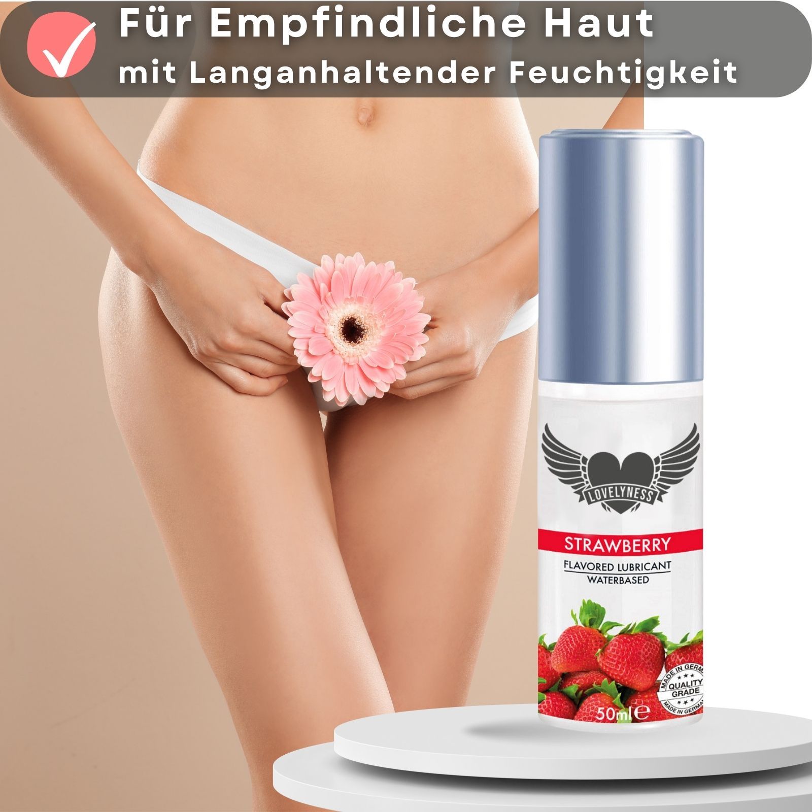Gleitgel-Flasche mit Erdbeeren und Text. Text: Strawberry, Flavored Lubricant, Waterbased.