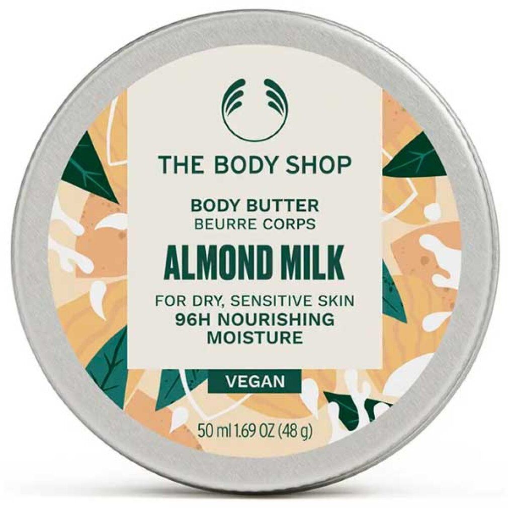 Runde Dose Body Butter von The Body Shop. Aufschrift: Almond Milk, für trockene, empfindliche Haut. Vegan. 50 ml.