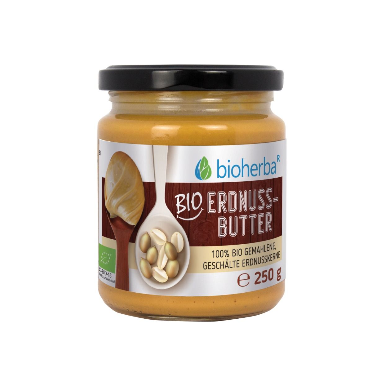 Glas mit Bio Erdnussbutter. Schwarzer Deckel. Aufschrift: Bio Erdnussbutter, 250 g. Bio-Siegel. Marke: Bioherba.