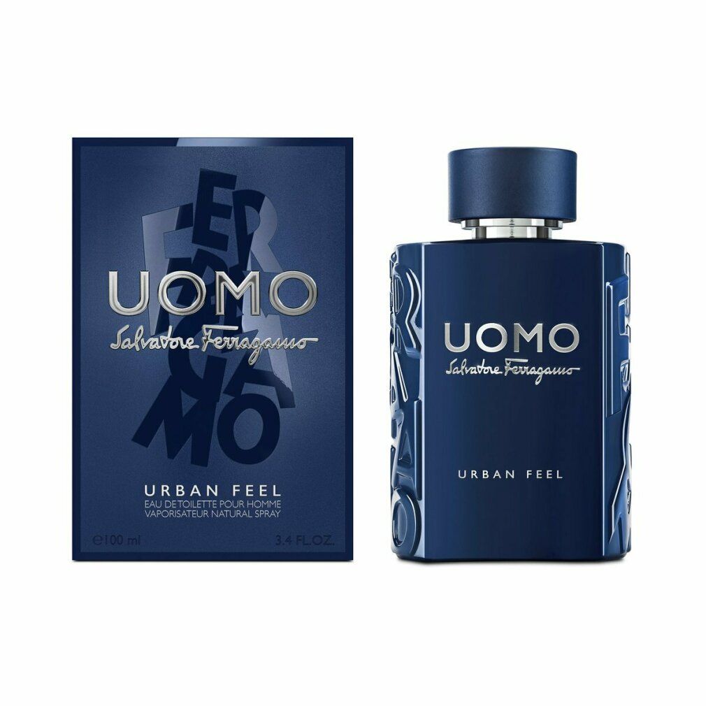 Dunkelblaue Flasche und Verpackung von Uomo Urban Feel. Aufschrift Uomo Salvatore Ferragamo und Urban Feel. Eau de Toilette.