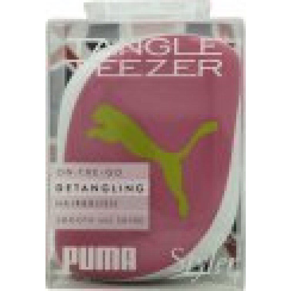 Pinkfarbene Haarbürste mit grünem Puma-Logo. Text: Tangle Teezer, Detangling Hairbrush. In transparentem Gehäuse.