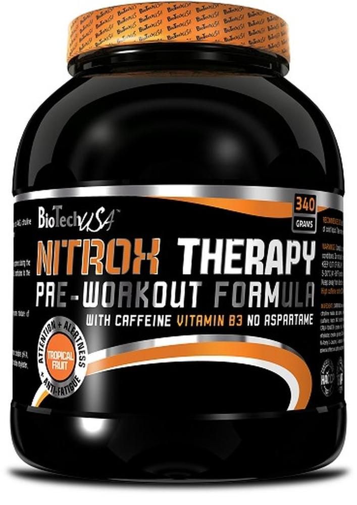 Schwarzes NitroX Therapy-Behälter mit orangefarbenem Deckel. Aufschrift: NitroX Therapy Pre-Workout Formula. Enthält Koffein, Vitamin B3, kein Aspartam.