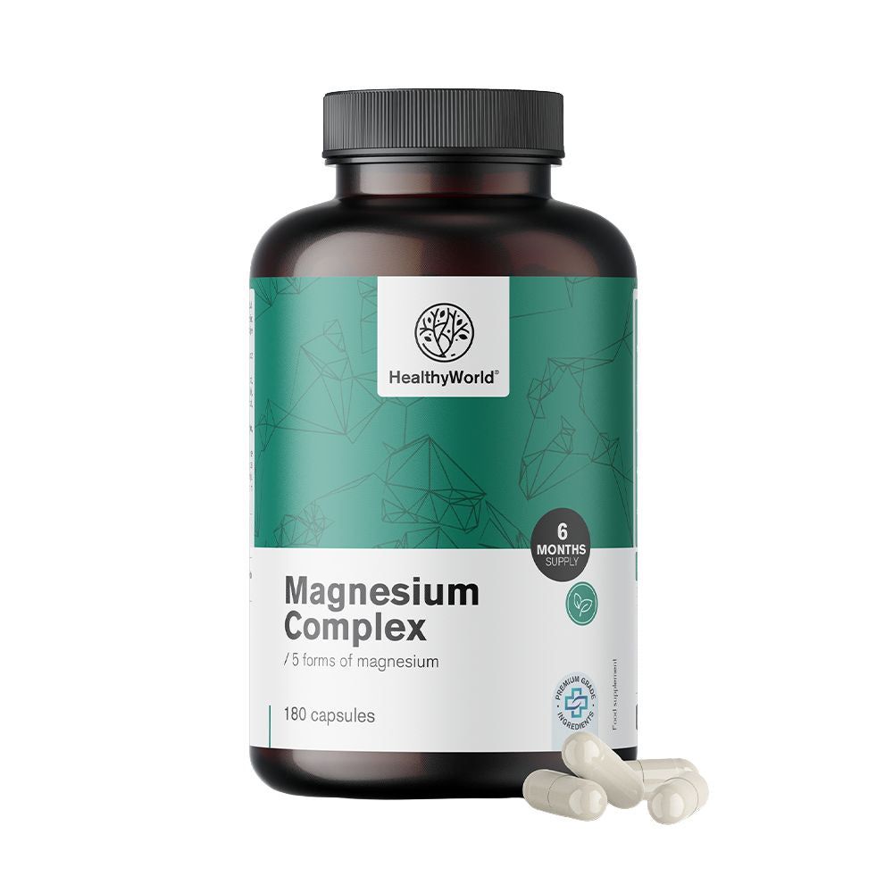 Braune Flasche mit grünem Etikett. Aufschrift: Magnesium Komplex, 180 Kapseln. Einige Kapseln liegen daneben. Logo: HealthyWorld.