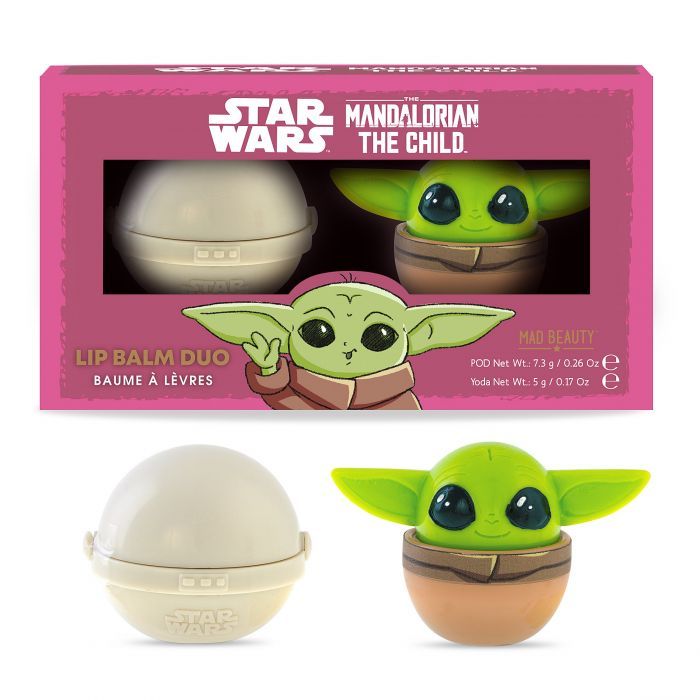 Lippenbalsam-Duo. Verpackung mit zwei kugelförmigen Behältern. Einer ist cremefarben, der andere stellt The Child dar. Text: Star Wars, Mandalorian.