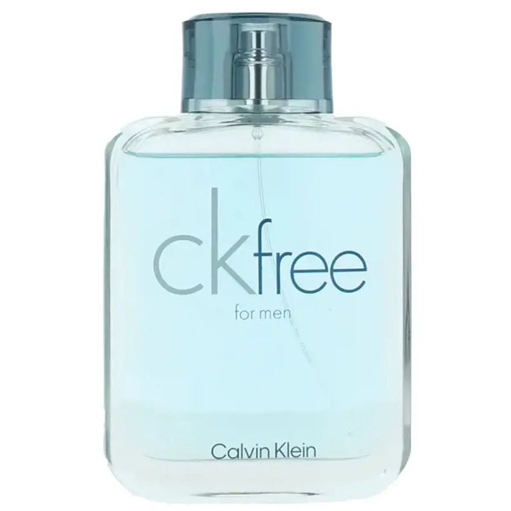 Calvin Klein CK Free Flakon. Rechteckiger Flakon mit blauem Inhalt und silbernem Verschluss. Aufschrift CK Free.