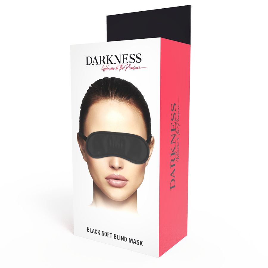 Verpackung mit Augenmaske. Produktname und Gesicht abgebildet. Schwarze Augenmaske sichtbar.