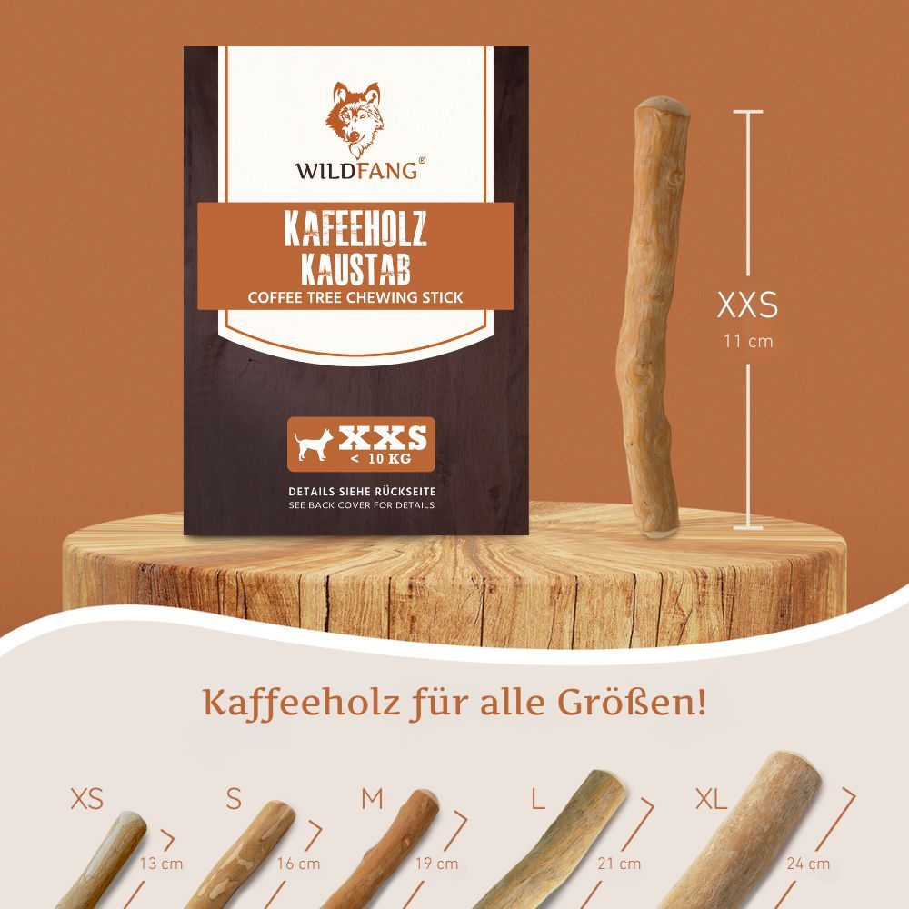 Kaffeeholz-Kaustab, XXS, 11 cm. Produktverpackung mit Logo und Größenangaben. Holzstab auf Holzsockel.