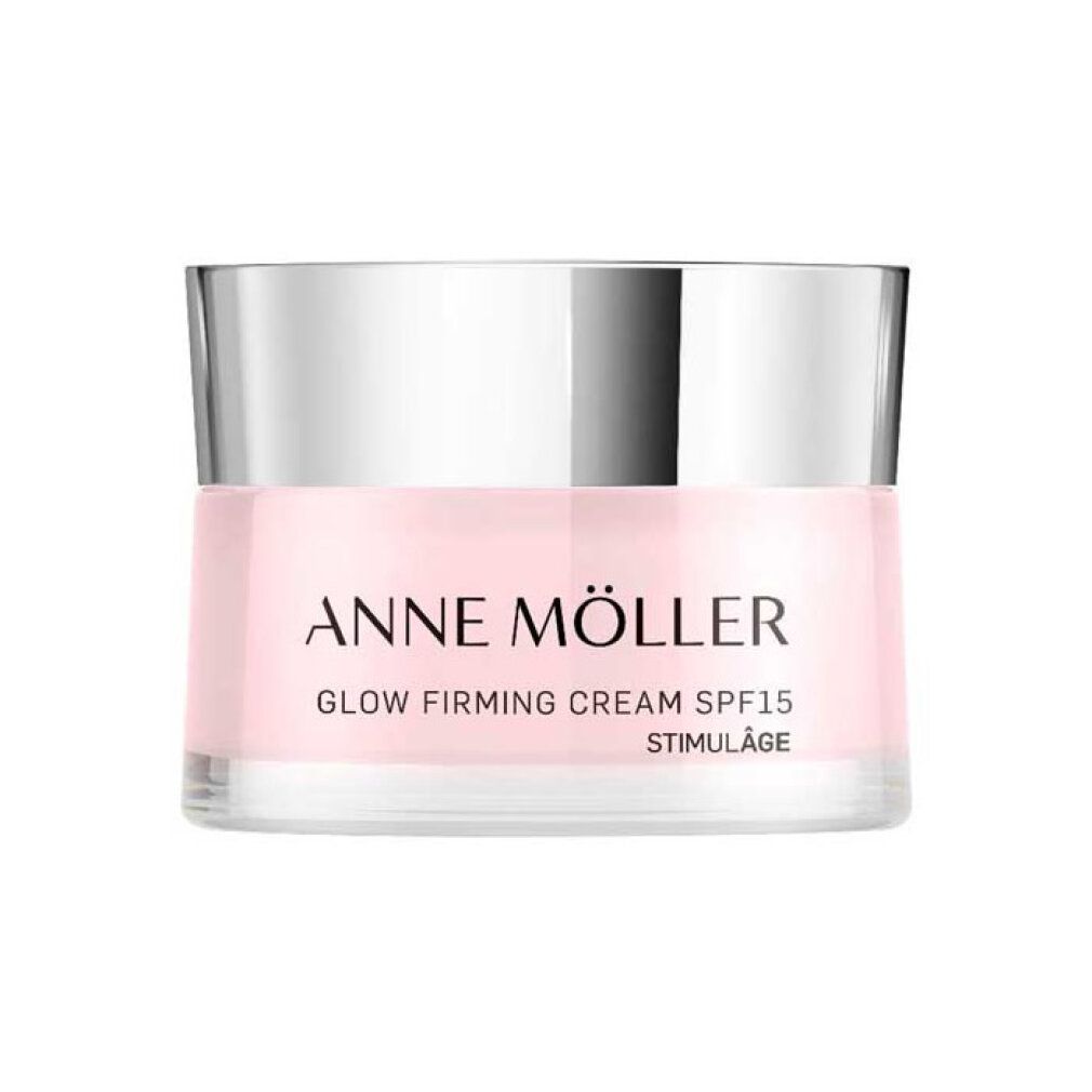 Creme-Tiegel mit silbernem Deckel. Aufschrift: ANNE MÖLLER, Glow Firming Cream SPF15, Stimulâge.