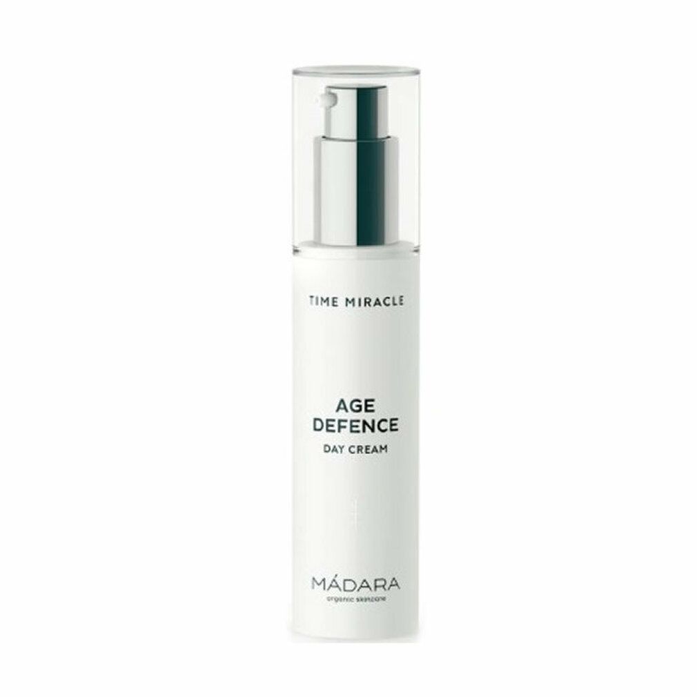 Weißer Creme-Flakon mit silbernem Pumpkopf. Aufschrift: Time Miracle Age Defence Day Cream. Marke: MÁDARA organic skincare.