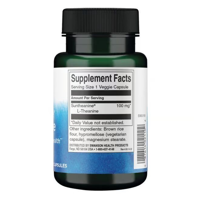 Rückseite einer grünen Flasche mit Kapseln. Aufschrift: Supplement Facts, Suntheanine L-Theanine, 100 mg. Zutaten.