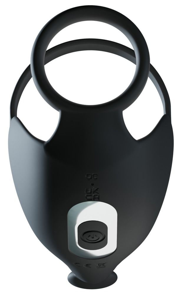 Schwarzer Penis- und Hodenring. Das Produkt hat eine runde Form und eine geschwungene Form. Es ist aus einem weichen Material gefertigt.