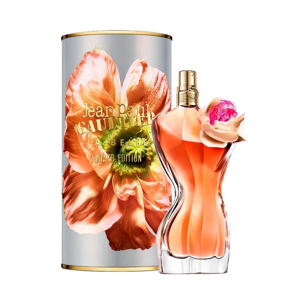 Parfümflakon in Torsoform mit rosa Blüte. Zylinderverpackung mit Blumenmotiv und Schriftzug.