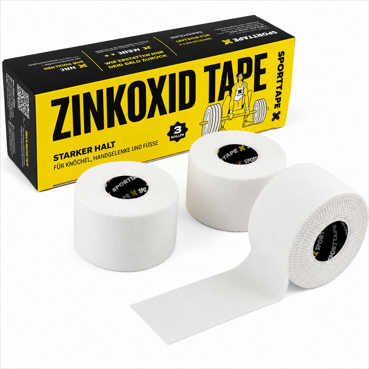 Drei Rollen weißes Zinkoxid-Sporttape liegen neben einer geöffneten Produktbox.