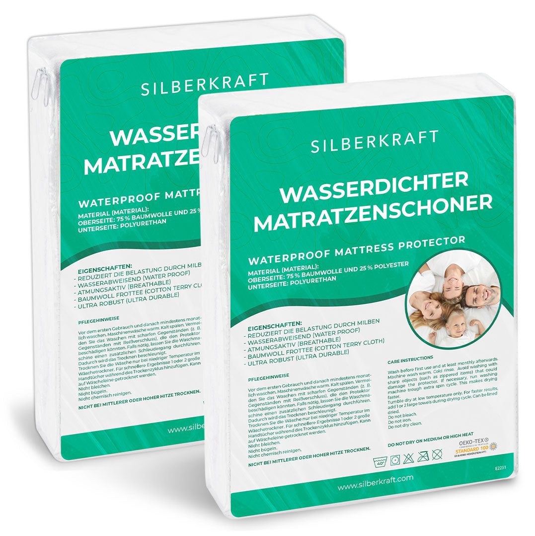Zwei verpackte Matratzenschoner. Aufdruck: SILBERKRAFT, wasserdicht, Material: Baumwolle und Polyester. Oeko-Tex-Zertifizierung.