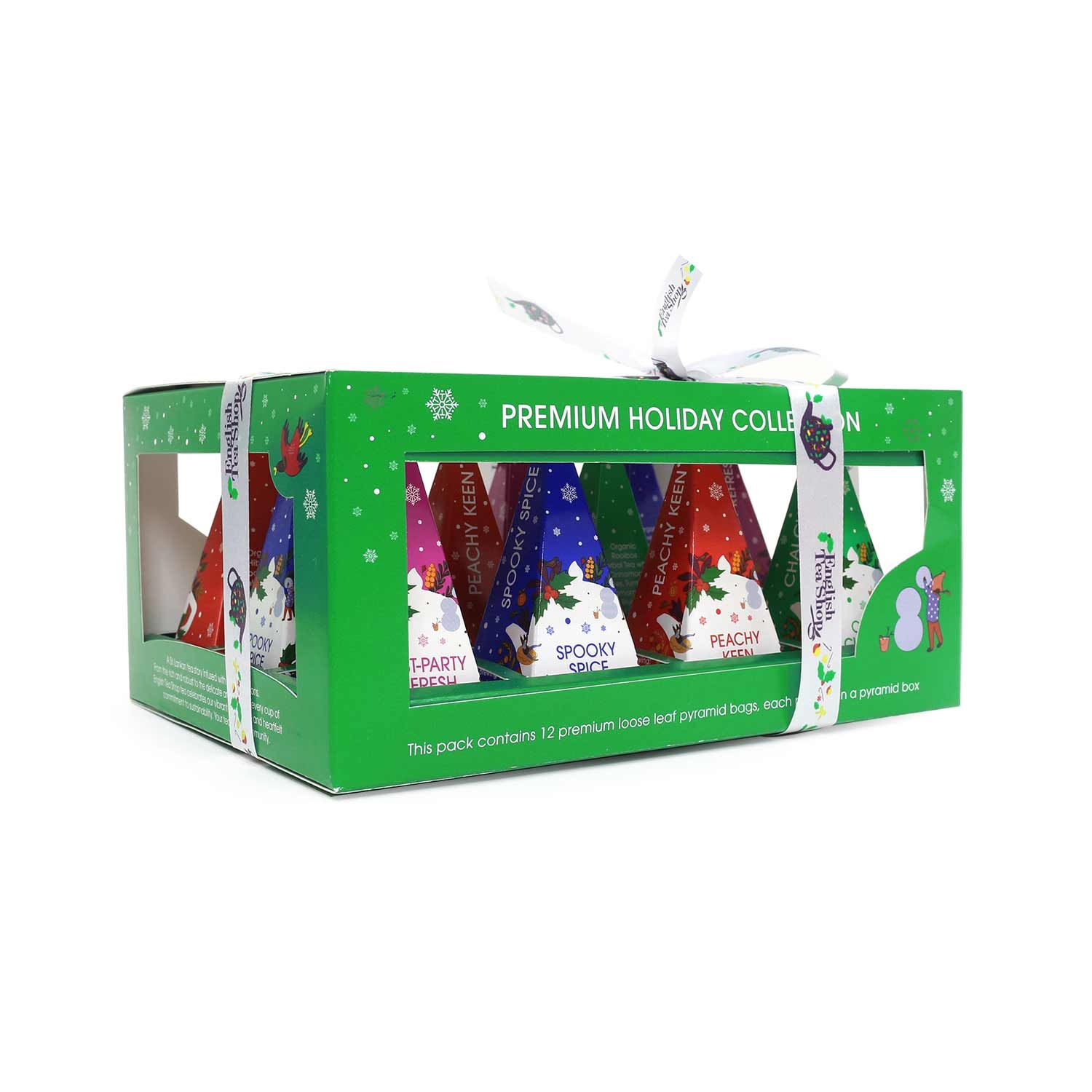 Grüne Box mit pyramidenförmigen Teebeuteln. Aufdruck: English Tea Shop, Holiday Collection. Mit Schleife.