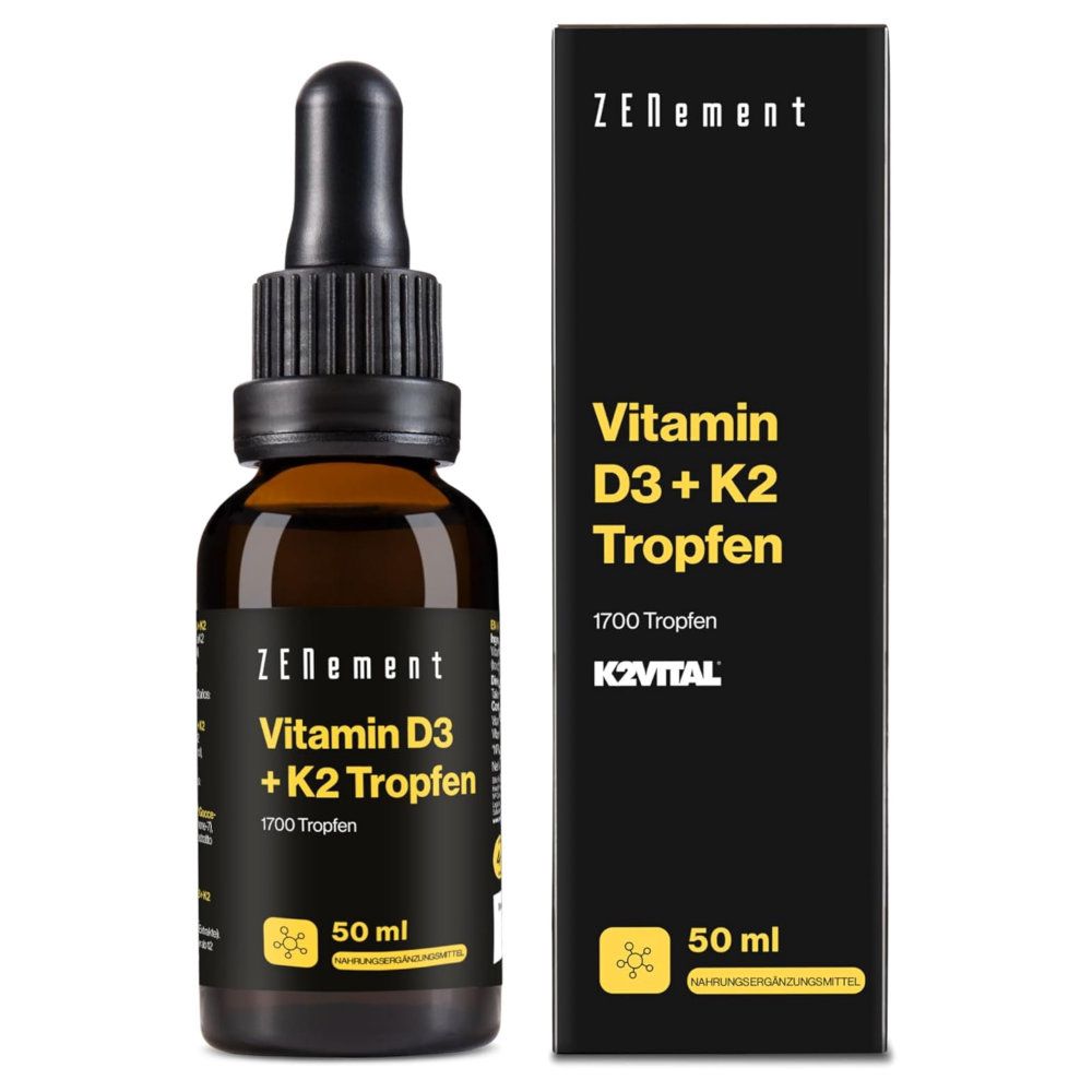 Braune Glasflasche mit Tropfer und schwarzem Deckel. Schwarze Verpackung mit Produktinformationen. Schriftzug: Vitamin D3 + K2 Tropfen.