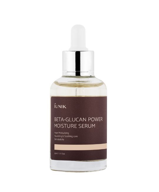 Serumflasche mit Pipette. Aufschrift: IUNIK, Beta-Glucan Power Moisture Serum. Braunes Etikett mit weißen Buchstaben.