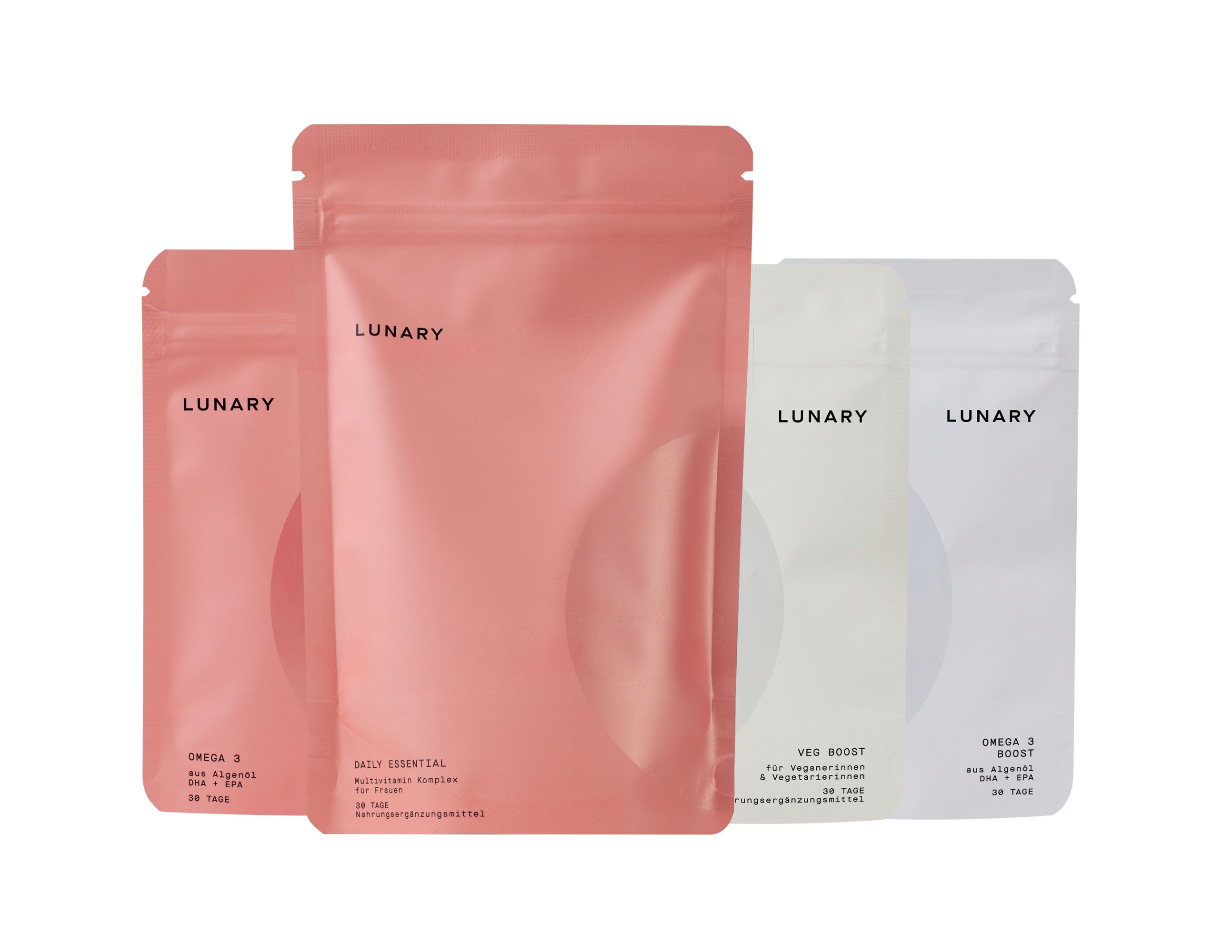 Drei Beutel, rosa und weiß, mit LUNARY-Logo. Aufschrift: Omega 3, Daily Essential, Veg Boost. Reißverschlussbeutel.