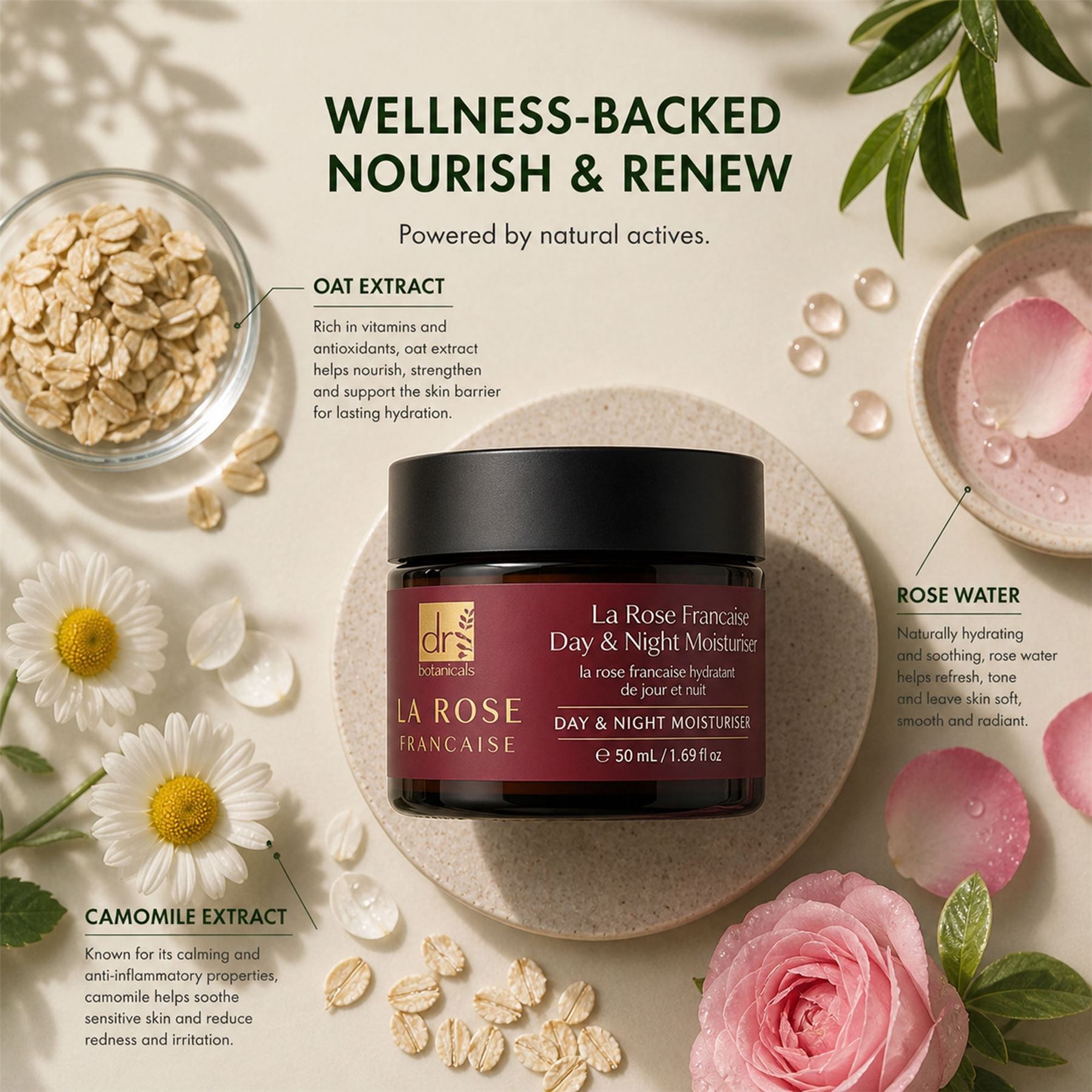Dr. Botanicals La Rose Française Tages- und Nachtcreme umgeben von Rosenblättern, Kamille und Hafer.