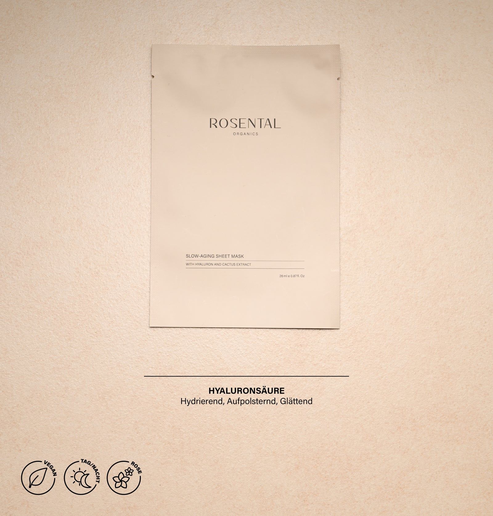Beige Verpackung, Rosental Organics. Aufschrift: Slow-Aging Sheet Mask. Inschrift: Mit Hyaluron und Kaktus Extrakt. Text: Hyaluronsäure.