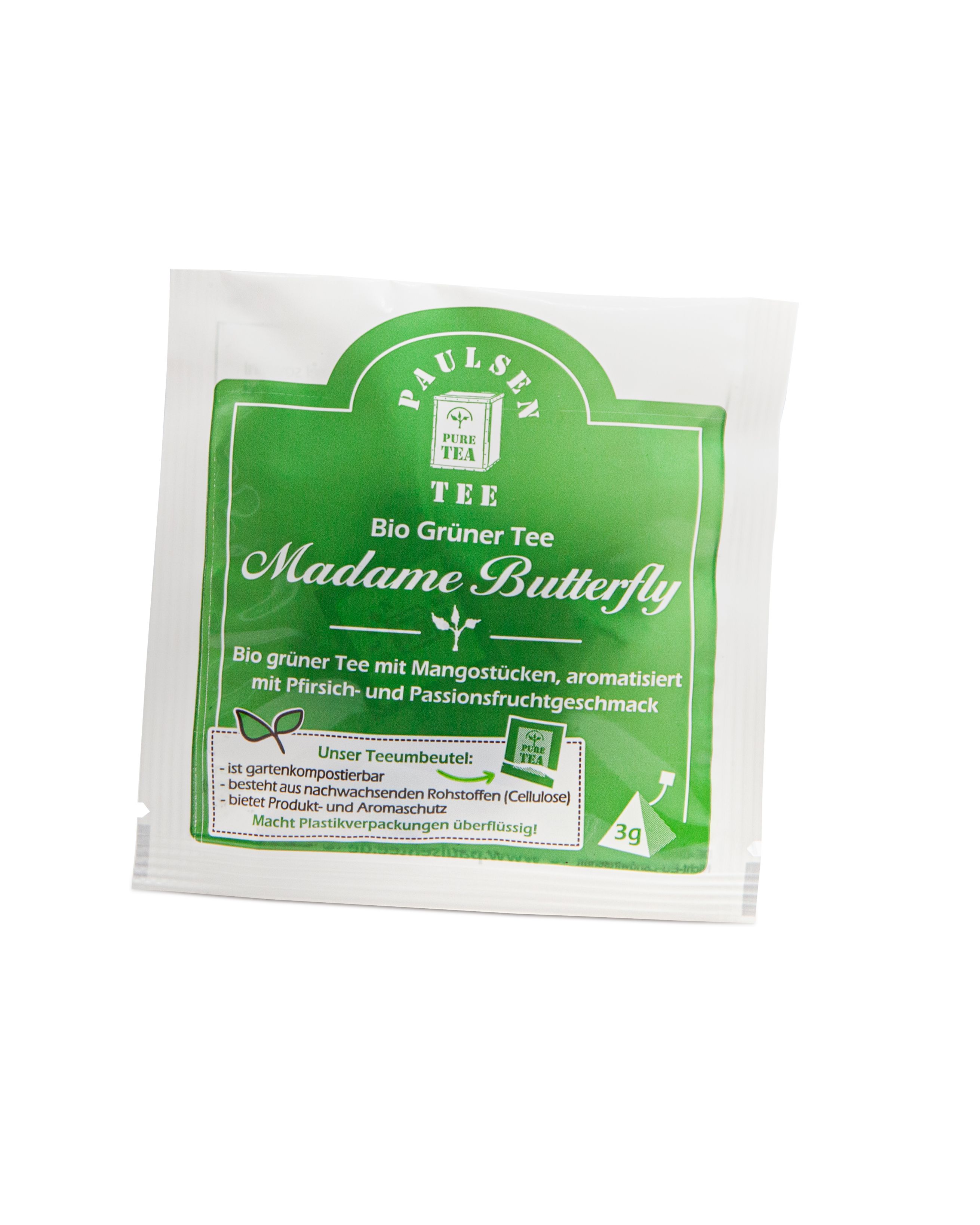 Einzelner grüner Teebeutel mit "Paulsen Tee" und "Madame Butterfly"-Logo. Beschriftung: Bio Grüner Tee mit Mangostücken.
