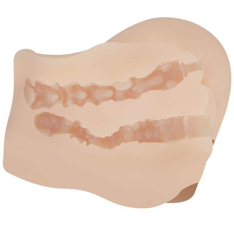 Masturbator aus hautfarbenem Material. Innere Struktur mit Rippen sichtbar.