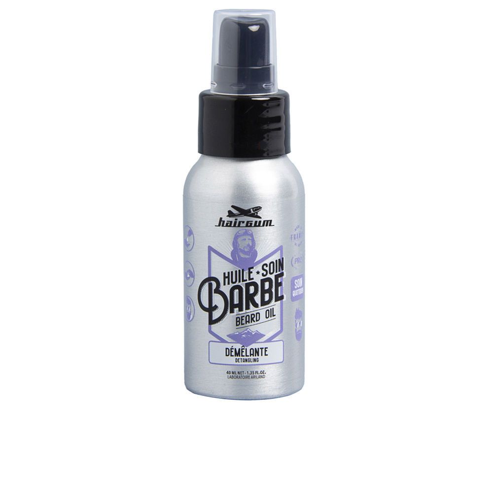 Bartöl-Flasche mit Zerstäuber. Silberne Flasche mit schwarzem Deckel. Aufschrift: Huile-Soin Barbe, Démêlante.