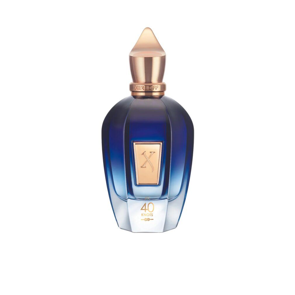 Blau-transparente Flasche mit goldfarbenem Verschluss. Goldfarbenes Etikett mit 'X' und '40 Knots'.