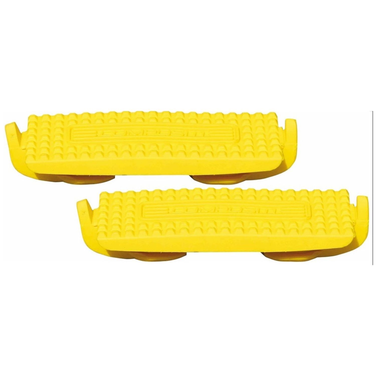 Zwei gelbe Steigbügeleinlagen. Rechteckige Form mit geriffelter Oberfläche und seitlichen Aussparungen. Unterseite mit runden Elementen.
