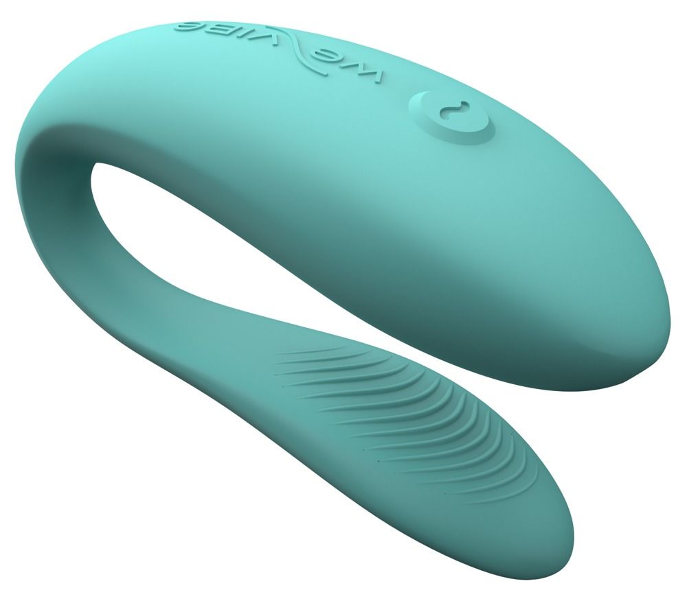 Türkisfarbener Vibrator. U-förmig mit geriffelter Oberfläche. We-Vibe Logo und Bedienknopf.