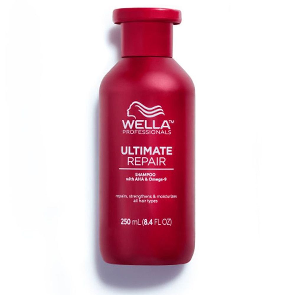 Rote Shampoo-Flasche mit weißem Etikett. Aufschrift: Wella Professionals Ultimate Repair Shampoo. 250 ml.