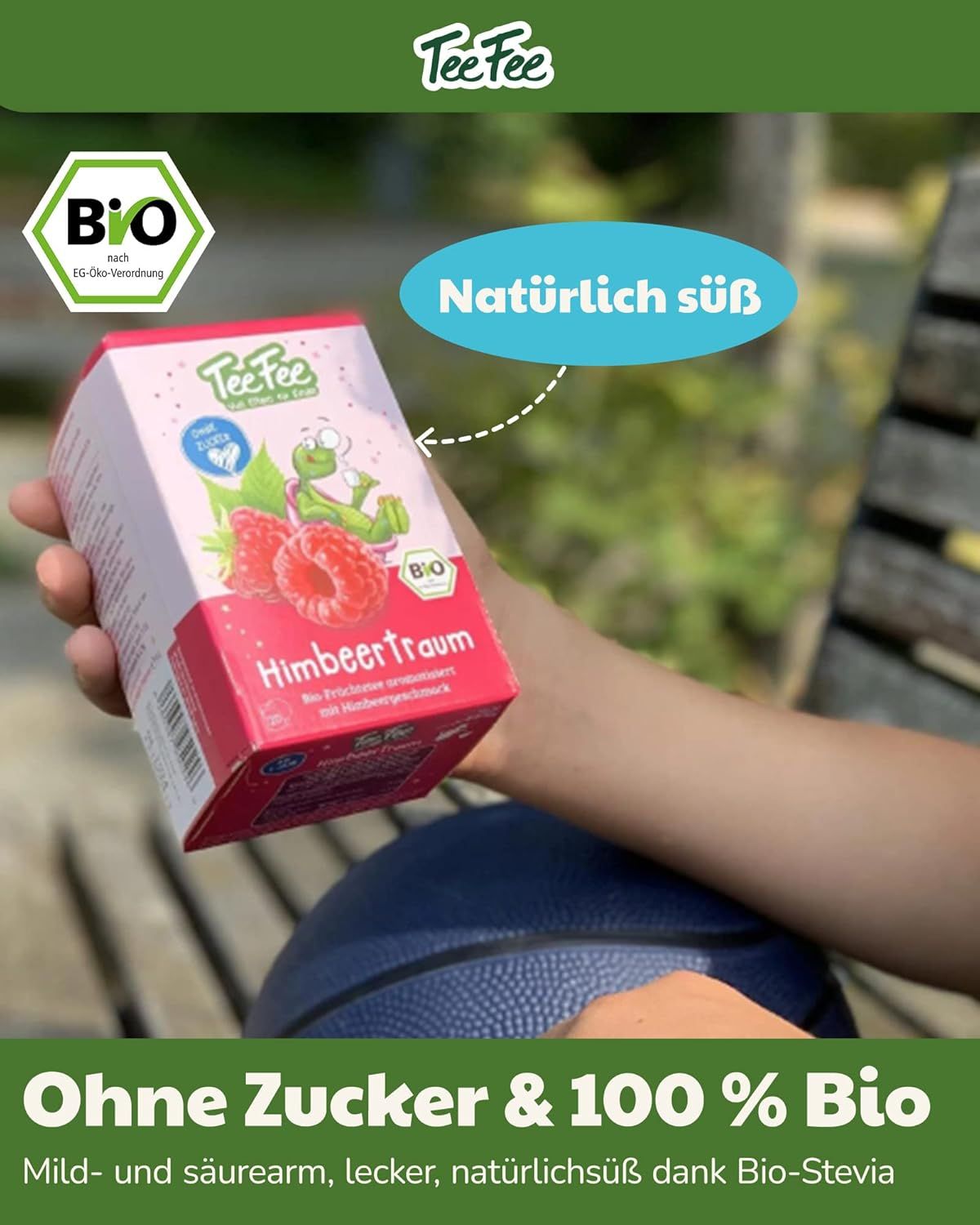 TeeFee Himbeer Traum Tee-Packung. Aufdruck: Himbeeren, Frosch, Bio-Siegel. Text: Ohne Zucker & 100% Bio. Natürliche Süße.