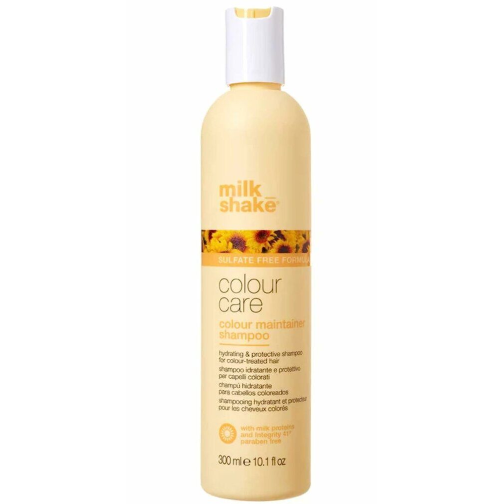 Gelbe Flasche mit weißem Verschluss. Aufschrift: milk_shake, colour care, colour maintainer shampoo. Text in mehreren Sprachen. Zusatz: Sulfatfrei.