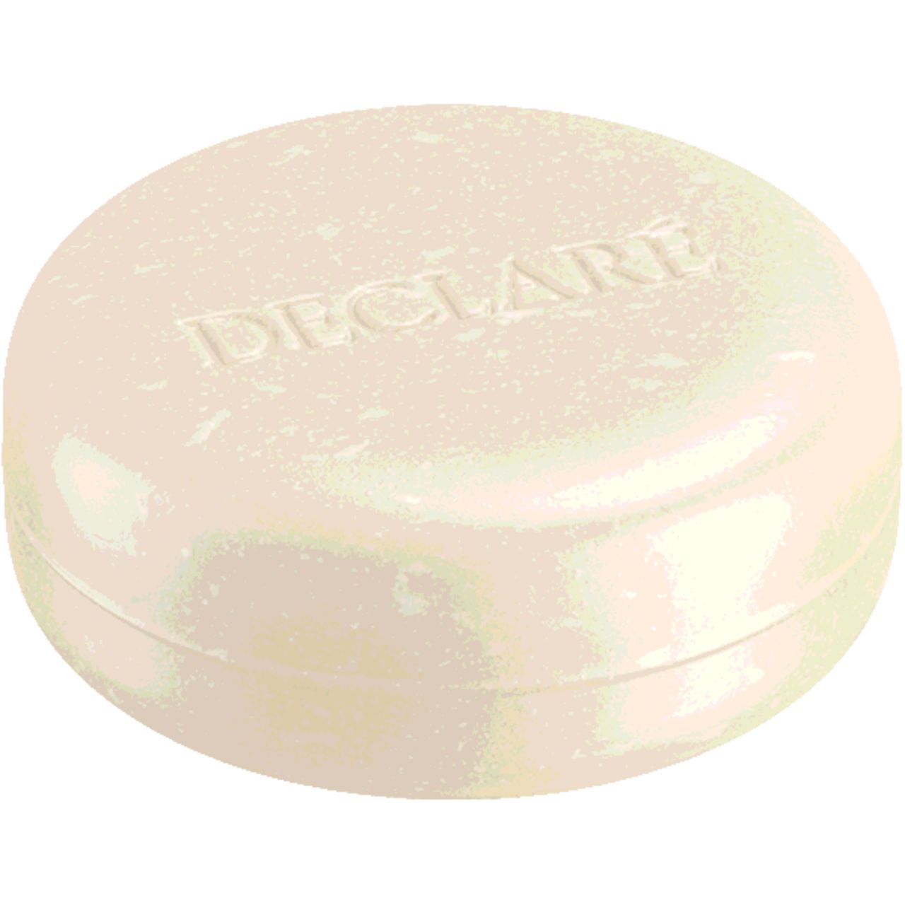 Runde Seife mit geprägtem DECLARE-Schriftzug. Helle Farbe, leicht gewölbte Form.