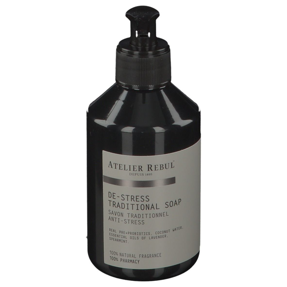 Schwarze Flasche mit Pumpe. Aufschrift: ATELIER REBUL, DE-STRESS TRADITIONAL SOAP. Enthält ätherische Öle.