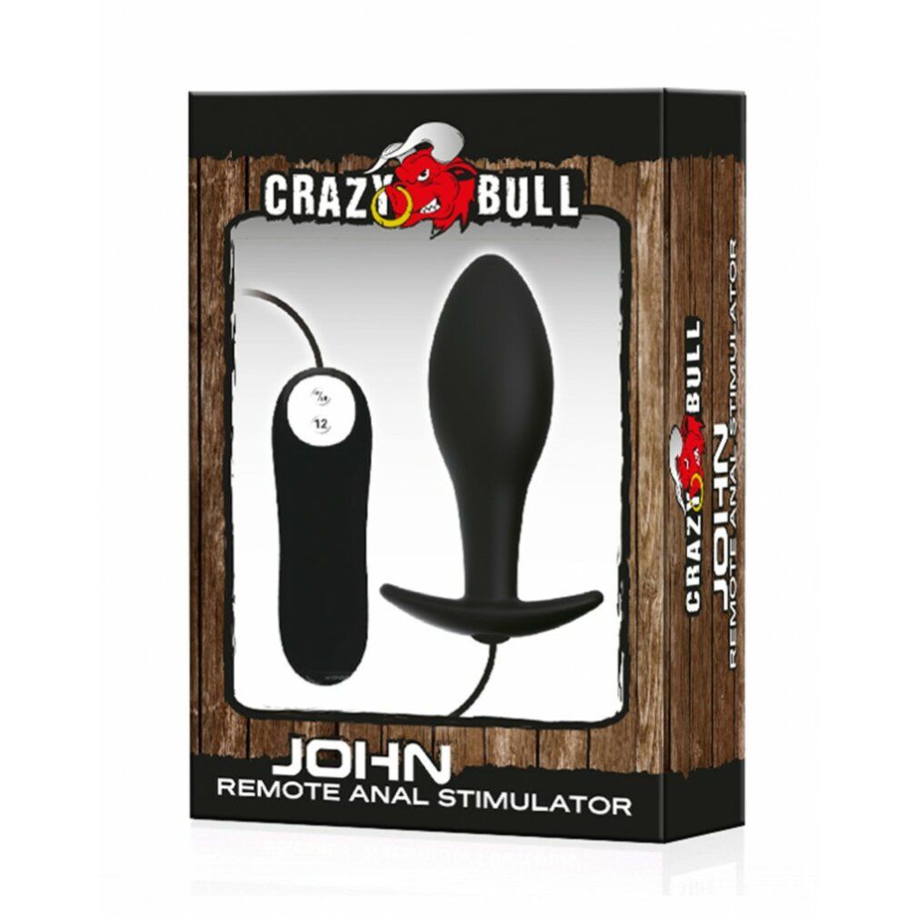 Verpackung mit Analplug und Fernbedienung. Schwarzer Plug, Holzoptik-Box, Text: CRAZY BULL, JOHN.