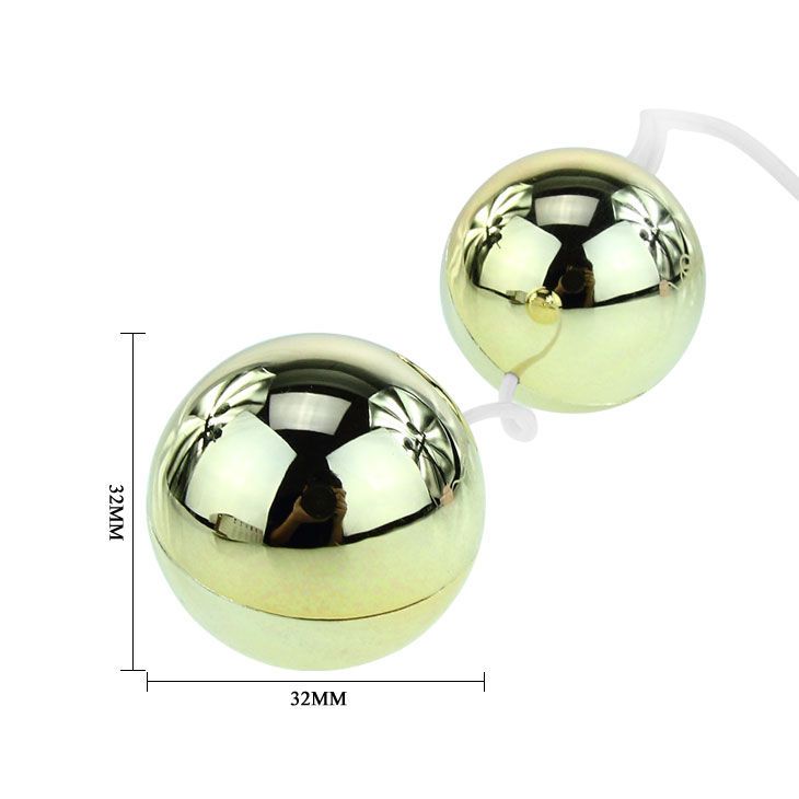 Zwei goldene Kugeln, jeweils 32mm, verbunden durch eine Schnur.