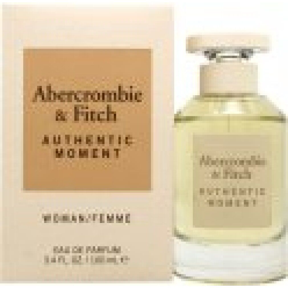 Parfümflakon und Verpackung. Aufschrift: Abercrombie & Fitch, Authentic Moment. Woman/Femme. Eau de Parfum.