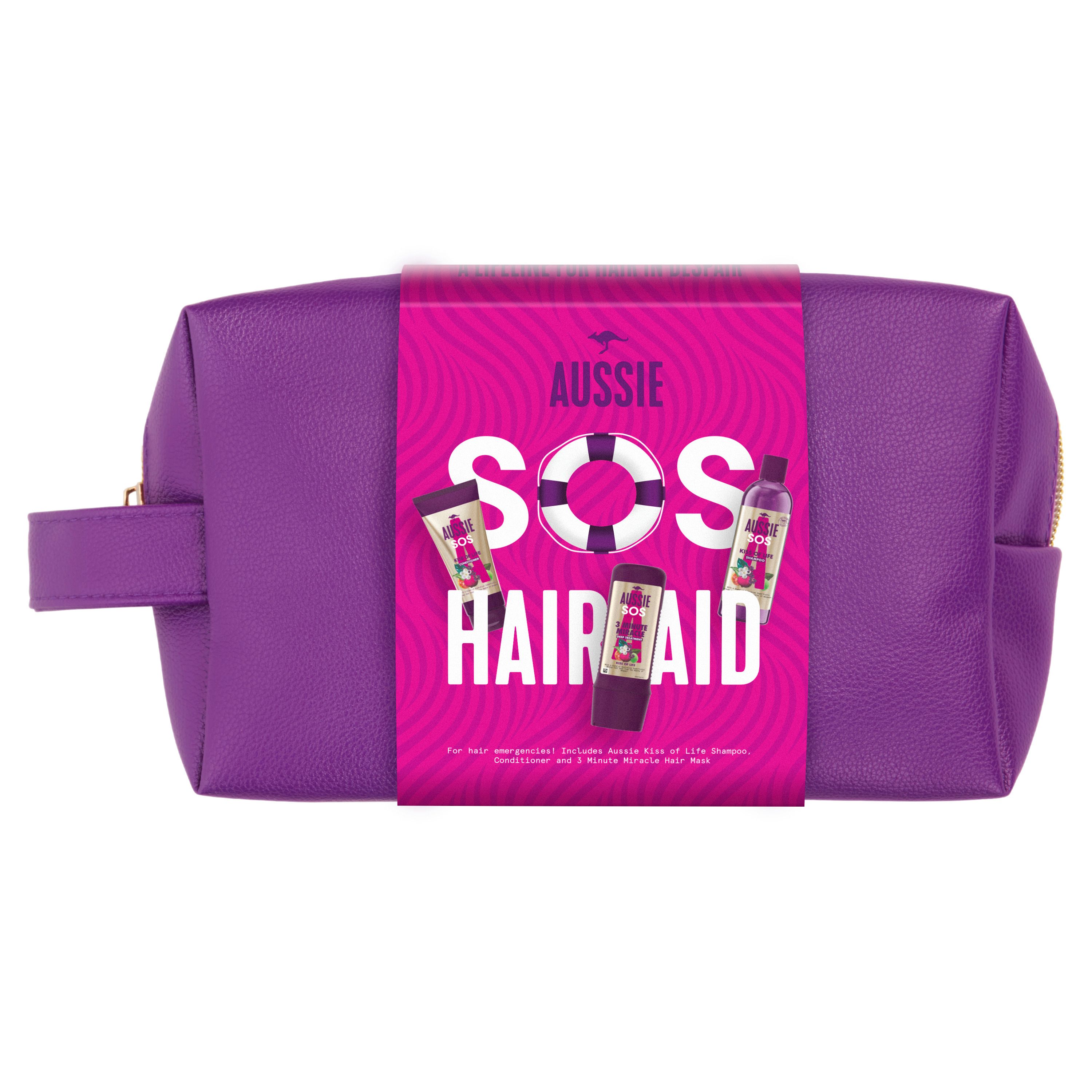 Lila Kosmetiktasche mit pinkfarbener Banderole. Aufdruck: AUSSIE SOS HAIR AID. Enthält Produkte für die Haarpflege.