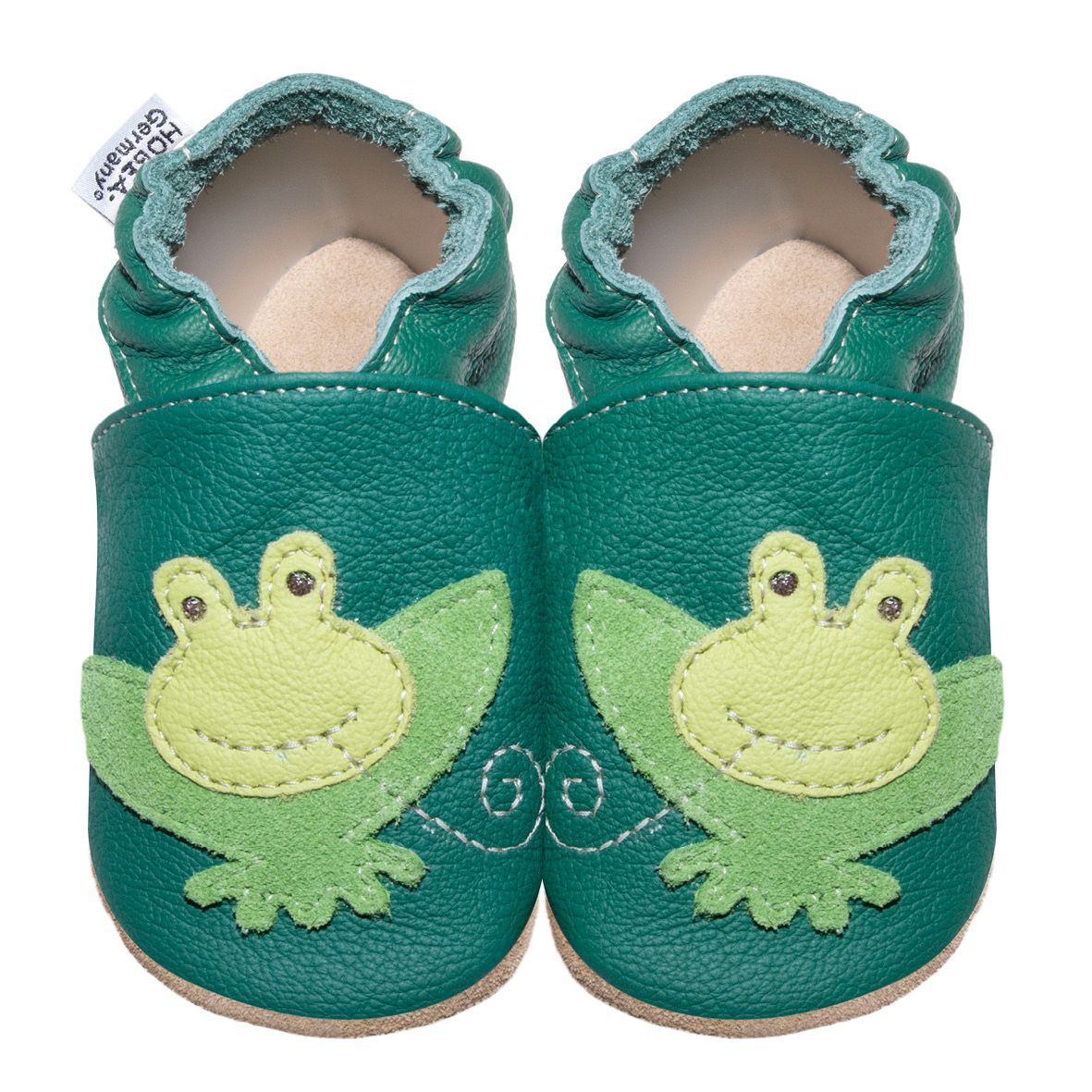 Grüne Kinderschuhe mit Froschmotiv. Marke HOBEA-Germany. Aus Leder. Zwei Schuhe nebeneinander, Froschgesicht auf der Vorderseite.