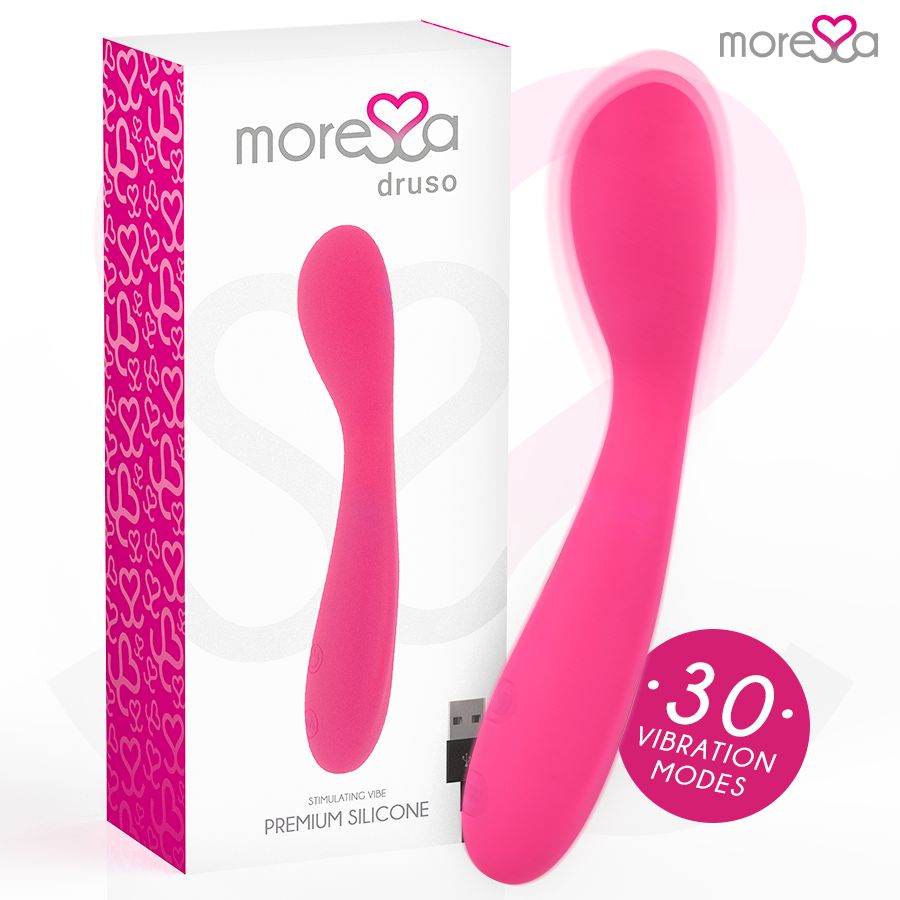 Pinker Vibrator mit ergonomischer Form und Ladeanschluss. Verpackung mit Herzmuster.