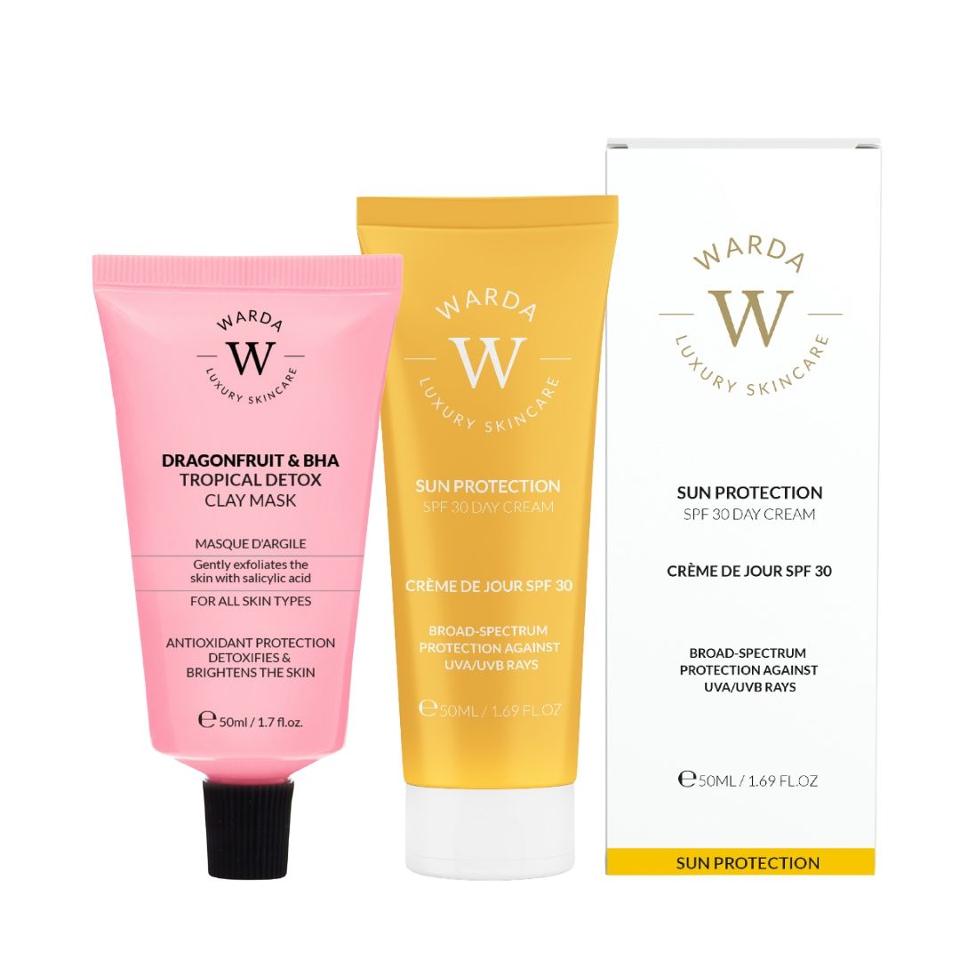 Drei Kosmetikprodukte: Rosa Tube, gelbe Tube und weiße Schachtel. Aufdruck: Warda Luxury Skincare, Sun Protection, SPF 30 Day Cream.