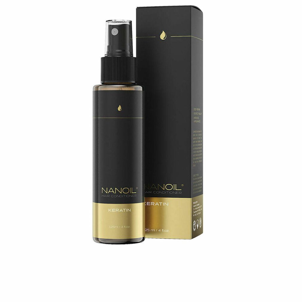 Haarconditioner mit Keratin, schwarze Flasche mit Sprühkopf und goldfarbenen Akzenten. Steht neben einer schwarzen Verpackung.